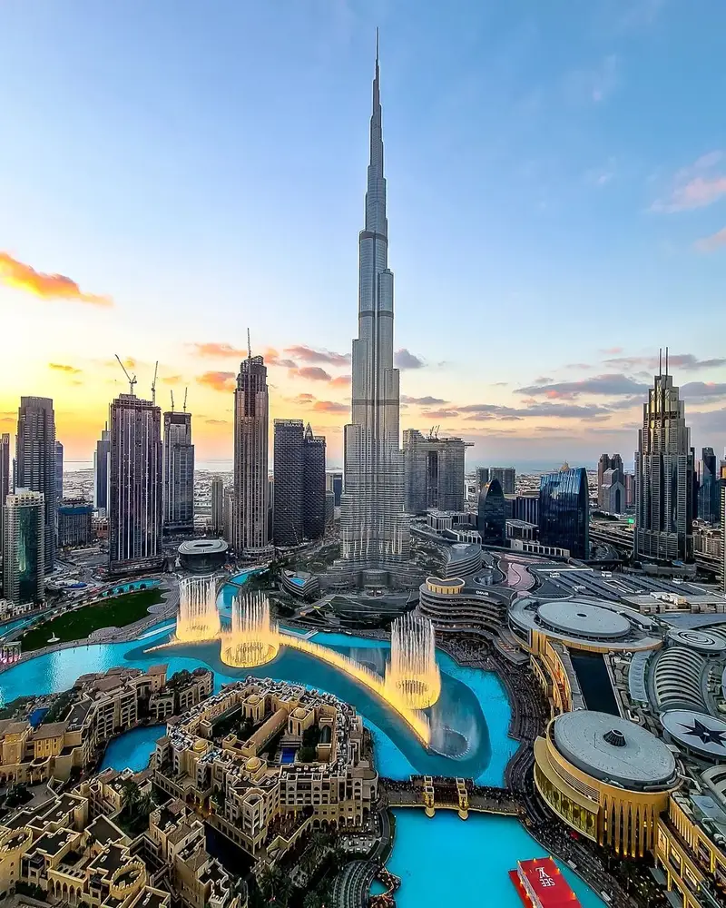 The Dubai skyline at sunset, with the Burj Khalifa